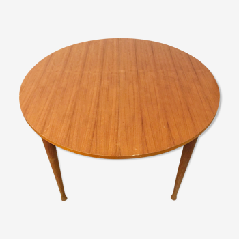 Round table with butterfly extension