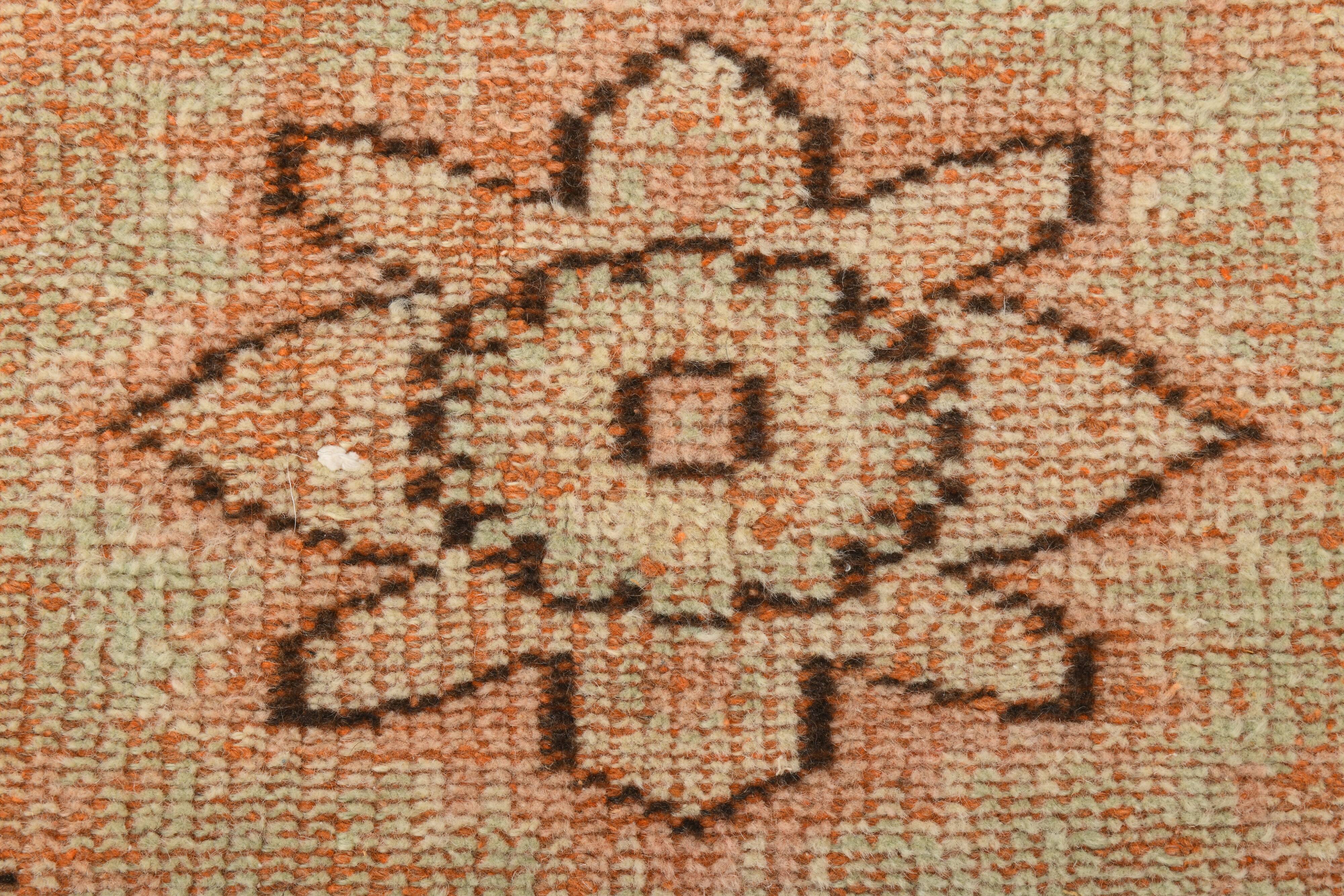 Tapis vintage rose poudré fait main en laine, style oriental doux