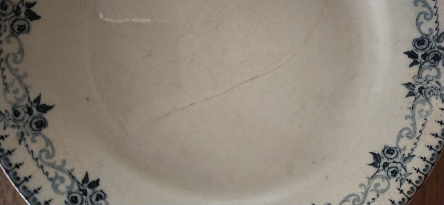 Set of two Terre de fer Parmentier hollow plates