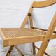 Chaise pliante à l'assise cannée