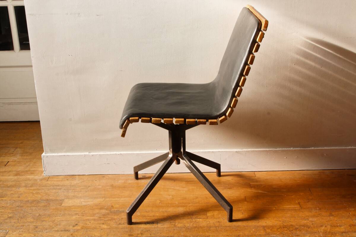 Handcrafted chair, laminated wood and leather