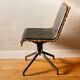 Handcrafted chair, laminated wood and leather