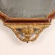 Neoclassical antique mirror in walnut, Italy, 18th century.