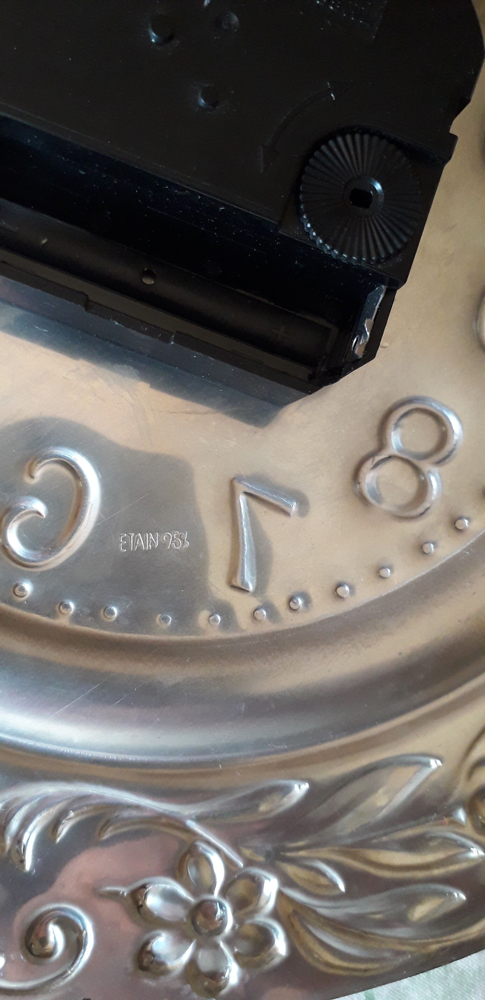 Repelled pewter wall clock floral decoration