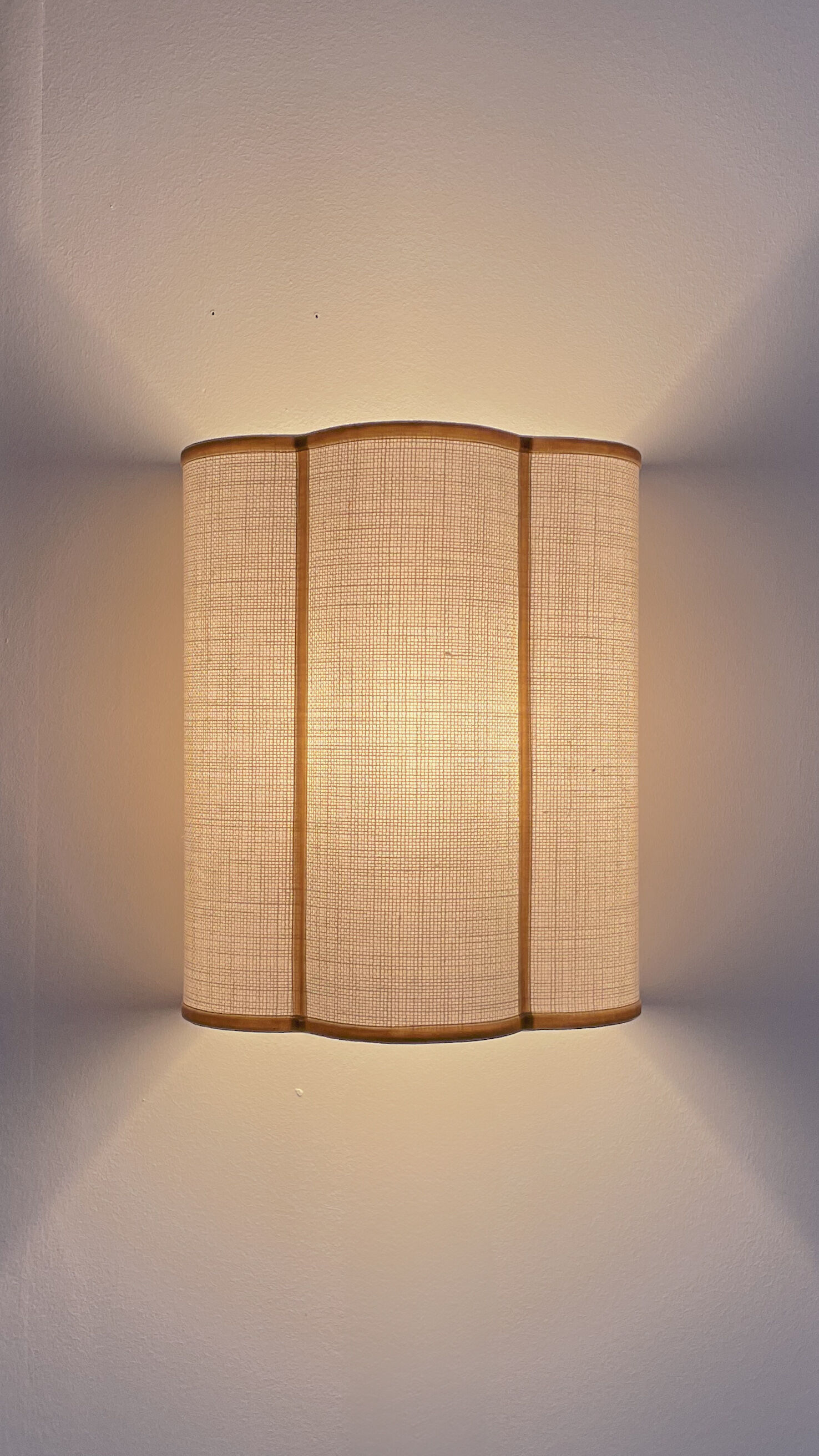 Cream jute wall sconces and bronze velvet trims
