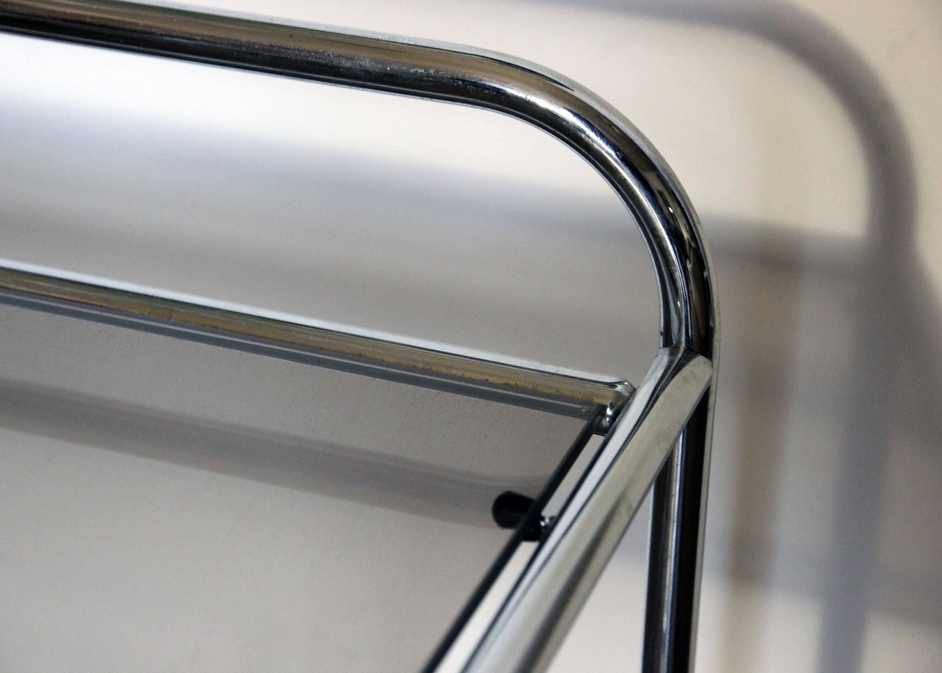 Stainless steel magazine holder side table