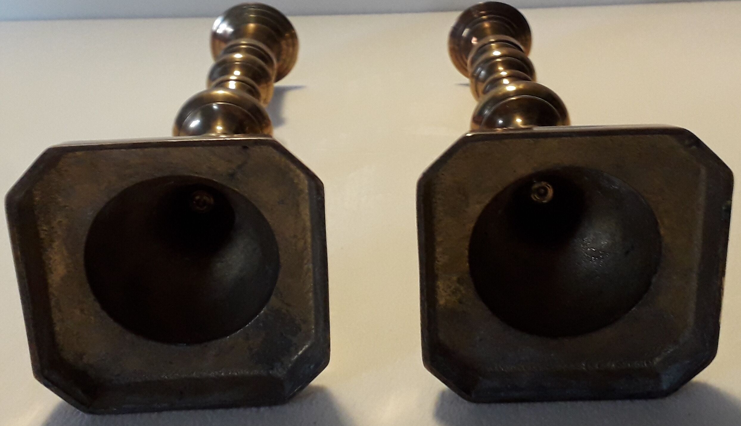 Duo of brass candle holders