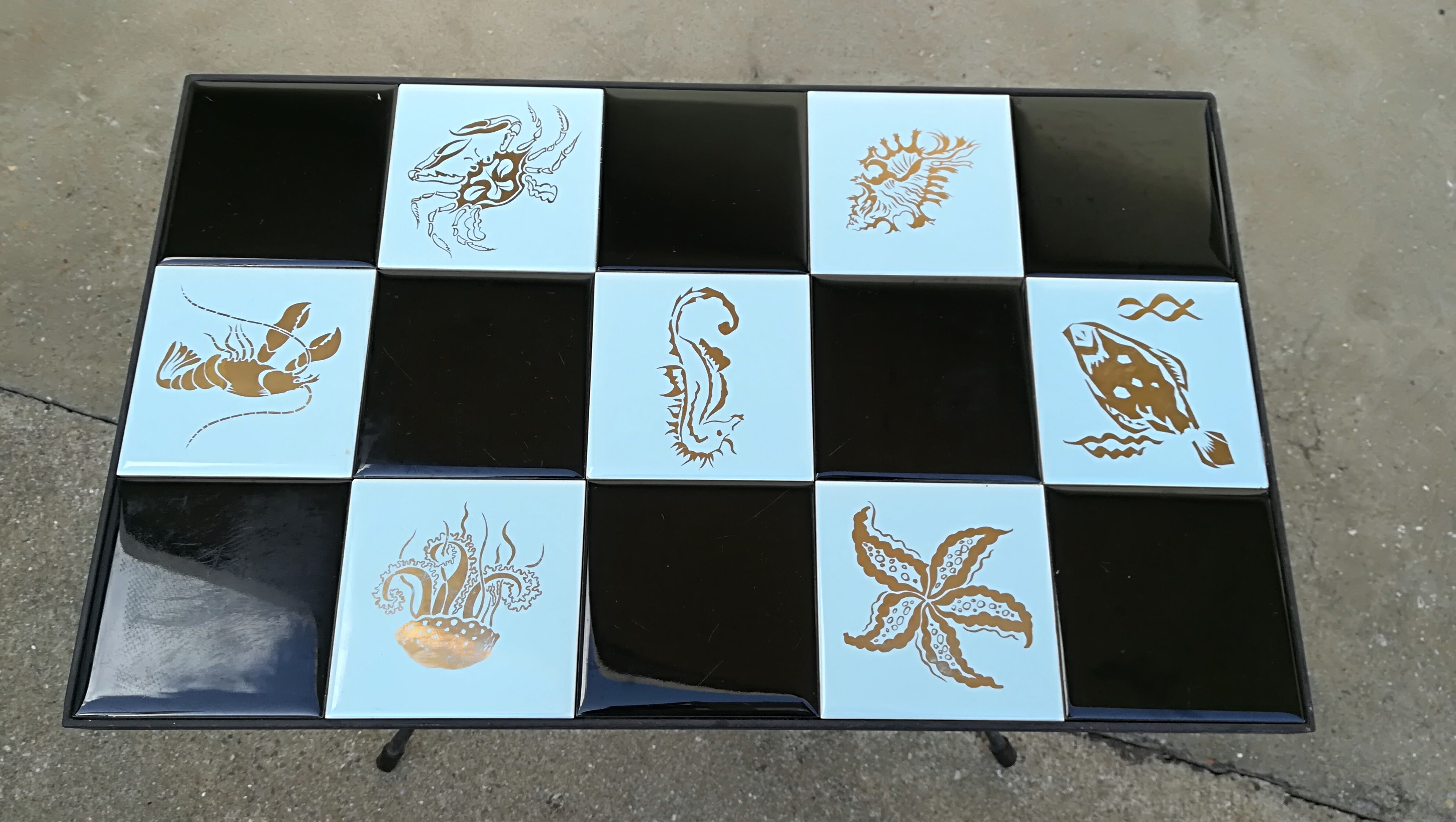 A side table at tiles in iron forge