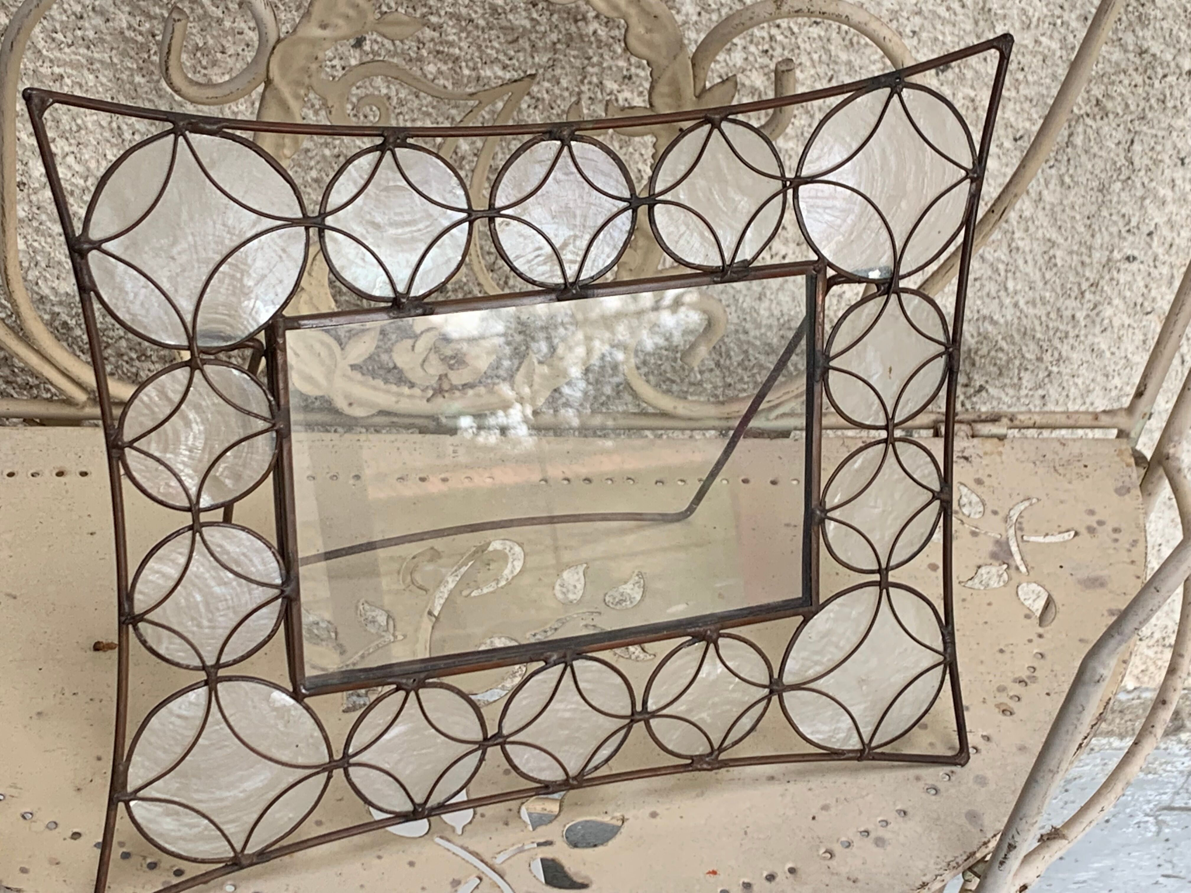 Metal frame and mother-of-pearl design and vintage