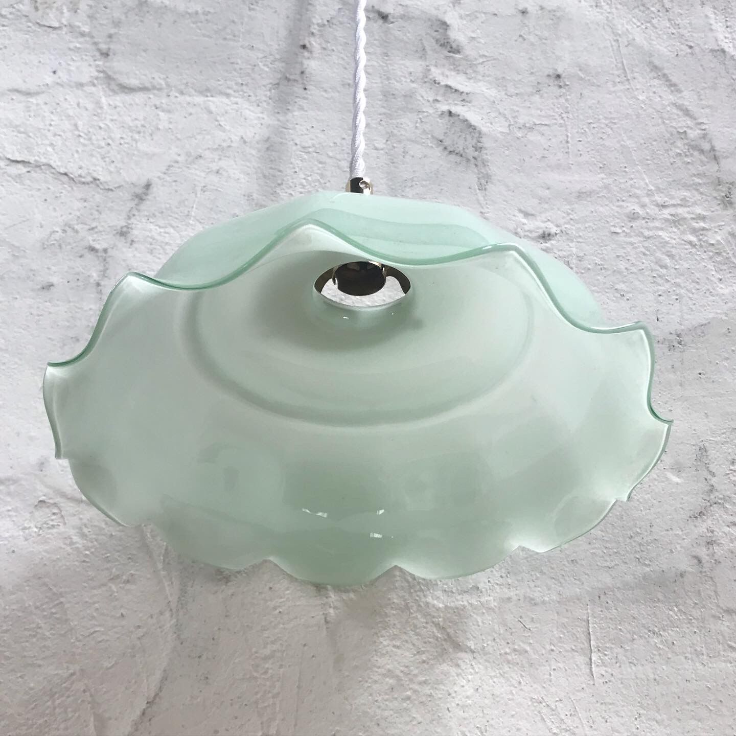 Green opaline suspension