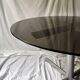Round designer dining table in metal and smoked glass, Roche Bobois 1970