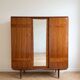 1950s wooden storage furniture with a mirror