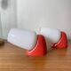 Pair of vintage wall lights in plastic and white opaline glass.