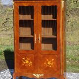 Glass library with rosewood marquetry in the Louis XV style.