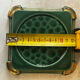 Art Deco bottle coaster in speckled green glazed ceramic and