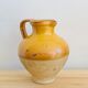 Vintage jug in glazed earth