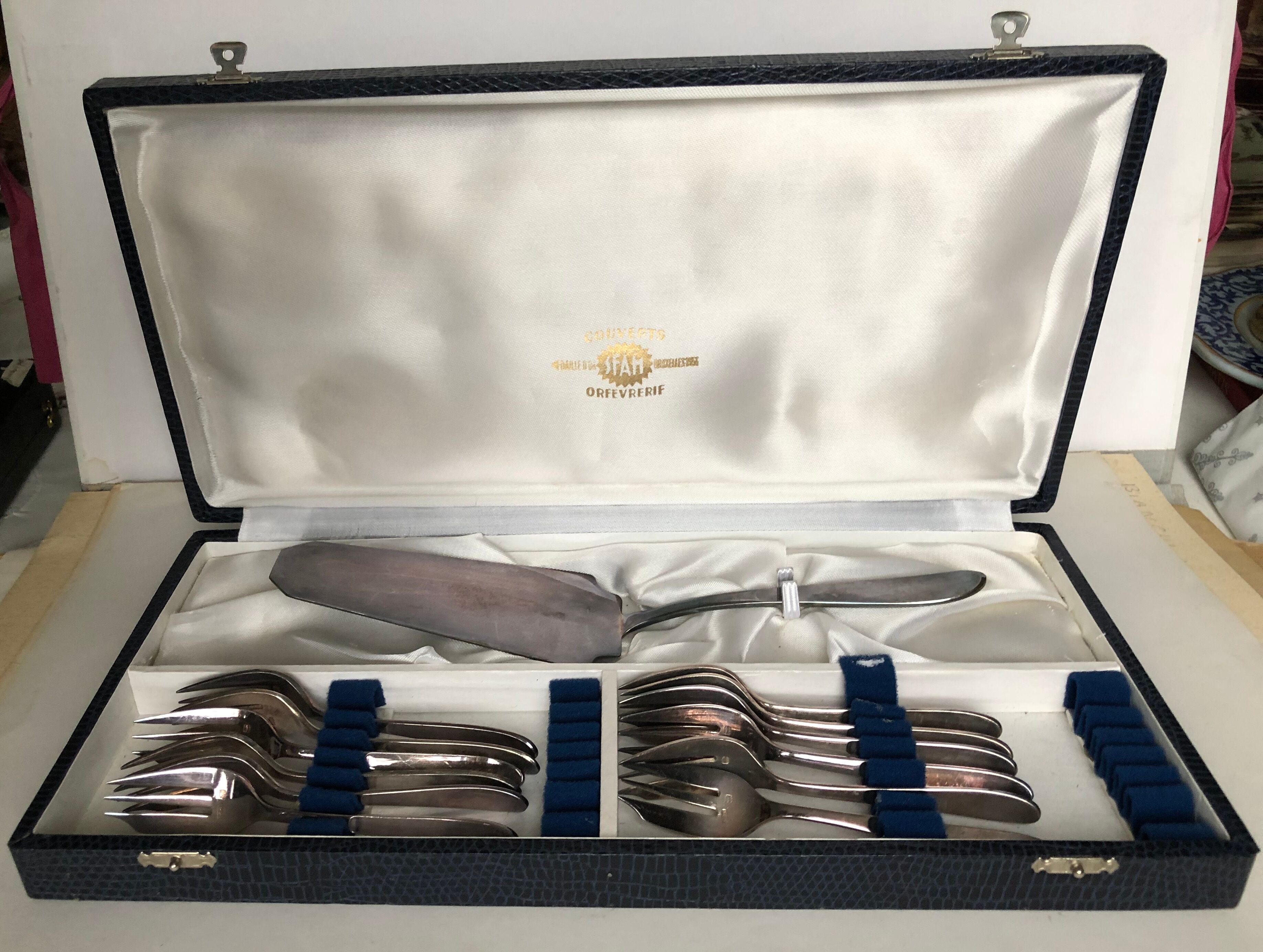 Set of 12 silver metal dessert forks