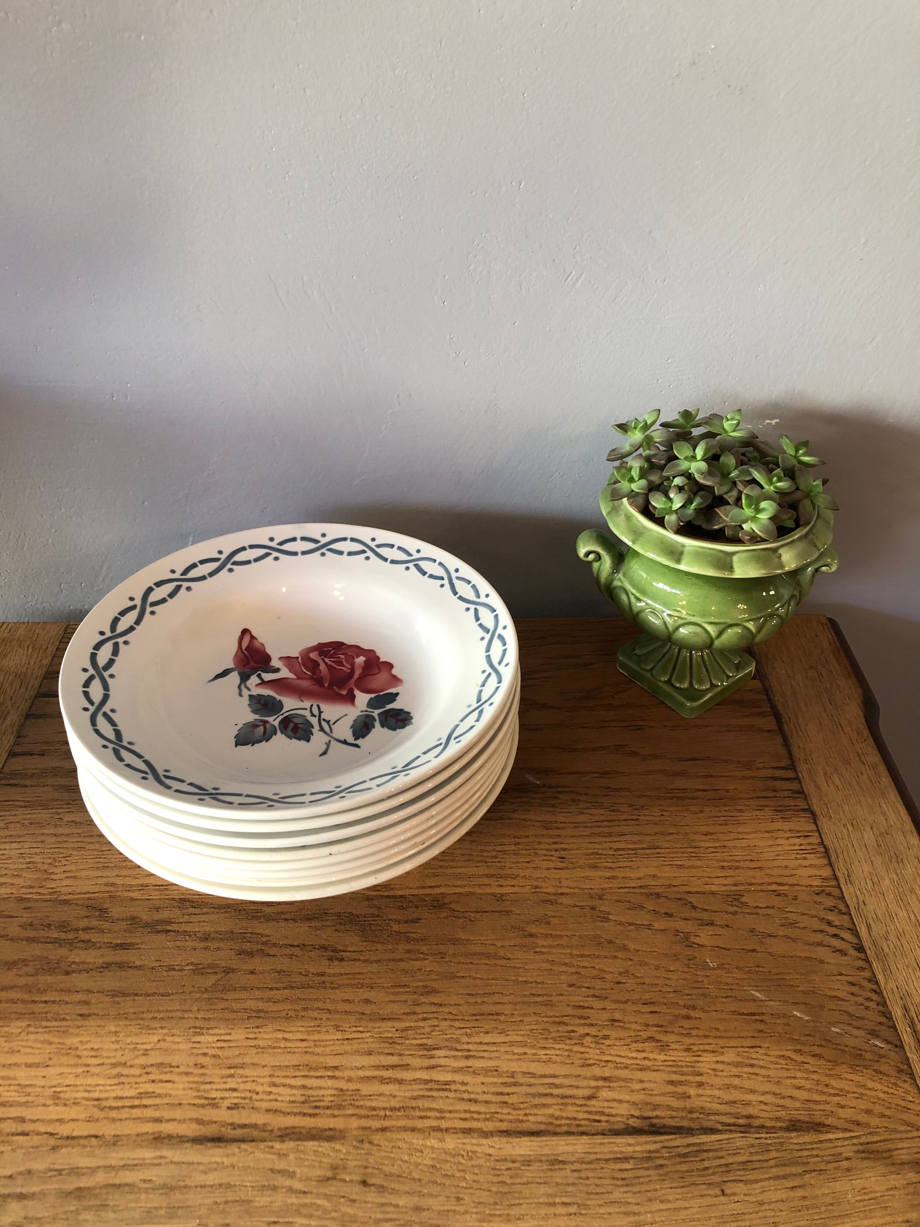 Set of 8 hollow plates in earthenware