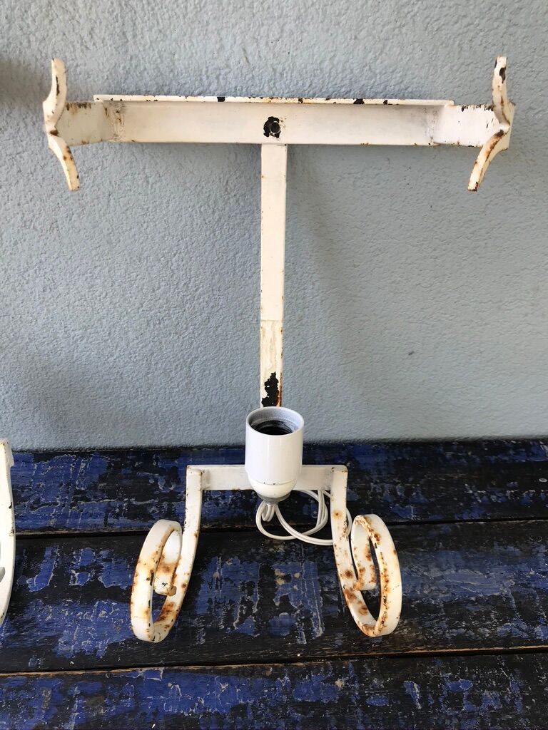 Lot of three terracotta and wrought iron appliques