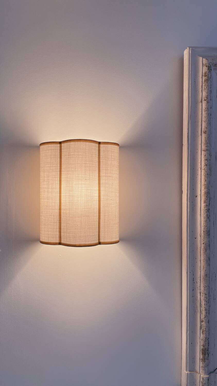 Pair of cream jute wall sconces and bronze velvet