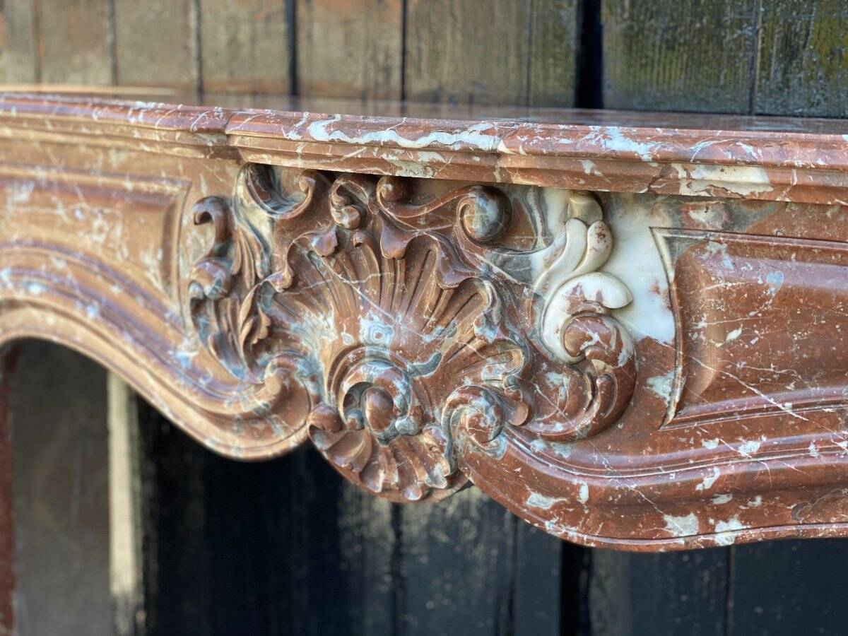 Louis XV style fireplace in Rance marble