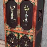 Asia, 20th century: Lacquered cabinet decorated with vases of flowers in hardstone