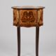 Wooden stool in the antique Louis XVI style.