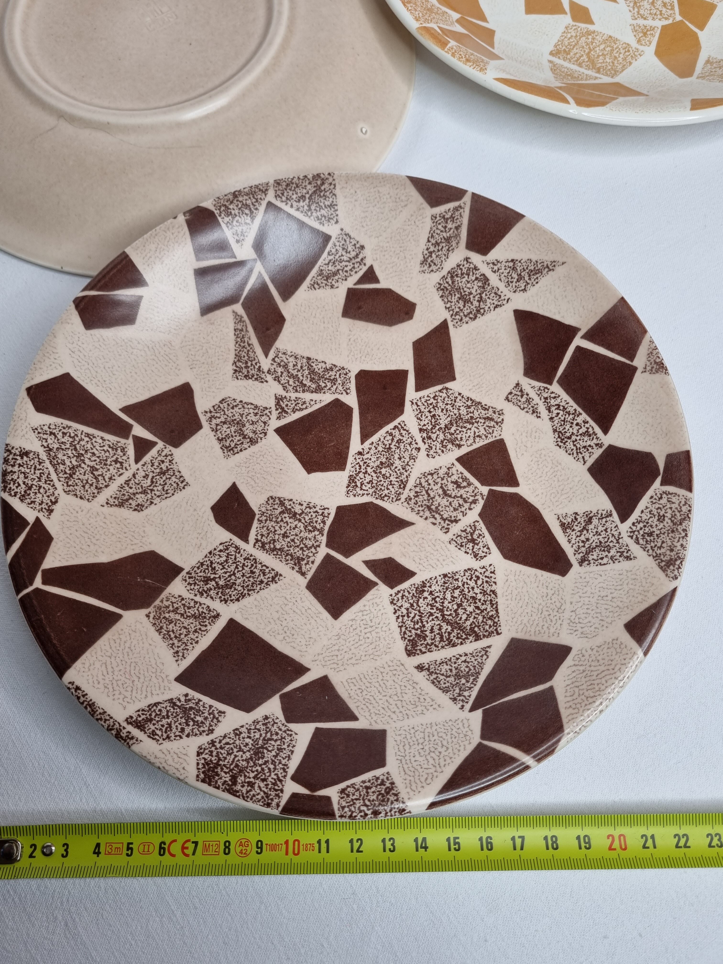 Set of four Terrazzo plates matched with gien earthenware, 22.5 cm