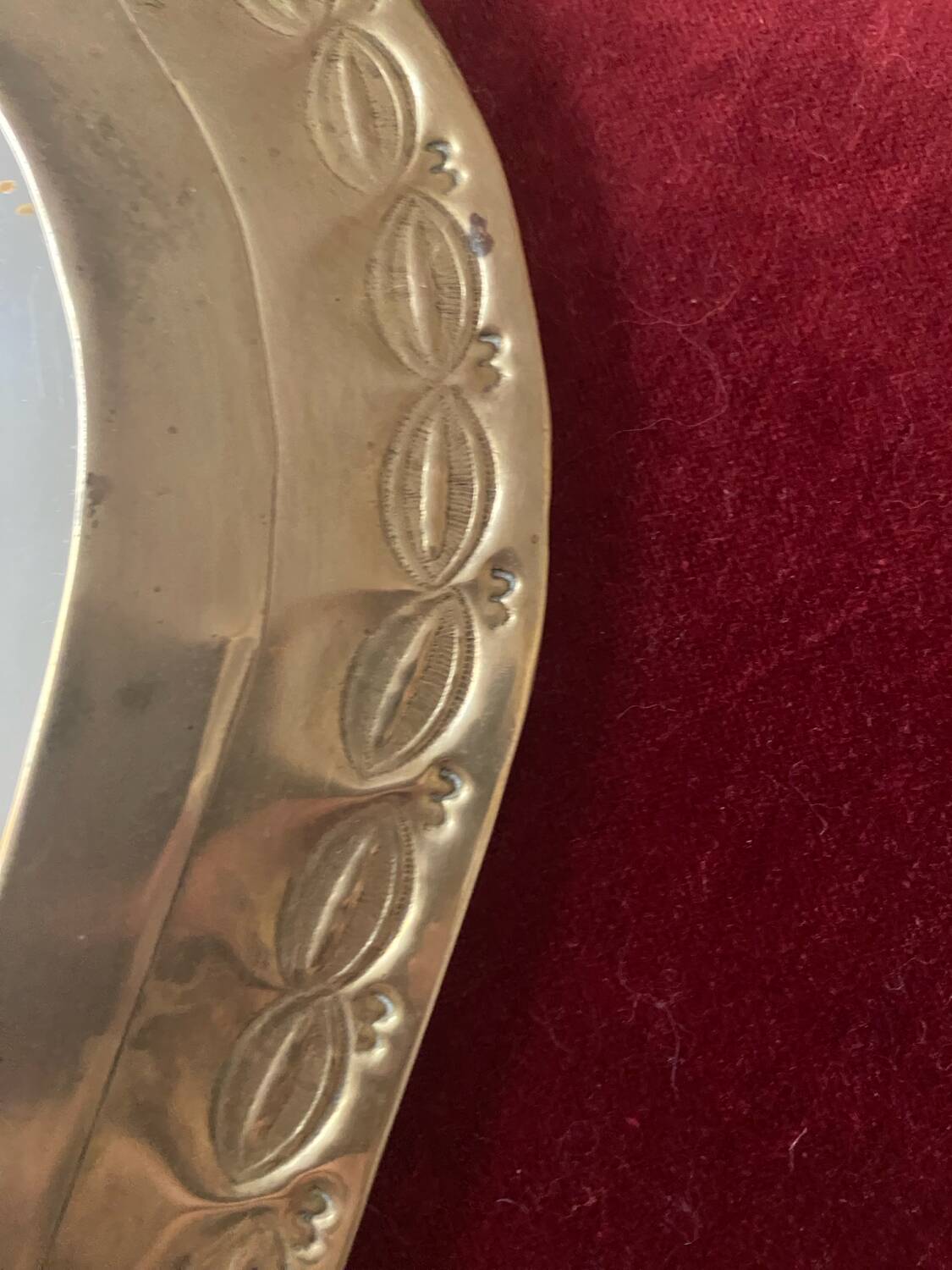 Ethnic brass mirror crafted in the 1980s.