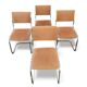 Set of 4 vintage sled chairs from the 1970s