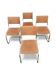 Set of 4 vintage sled chairs from the 1970s