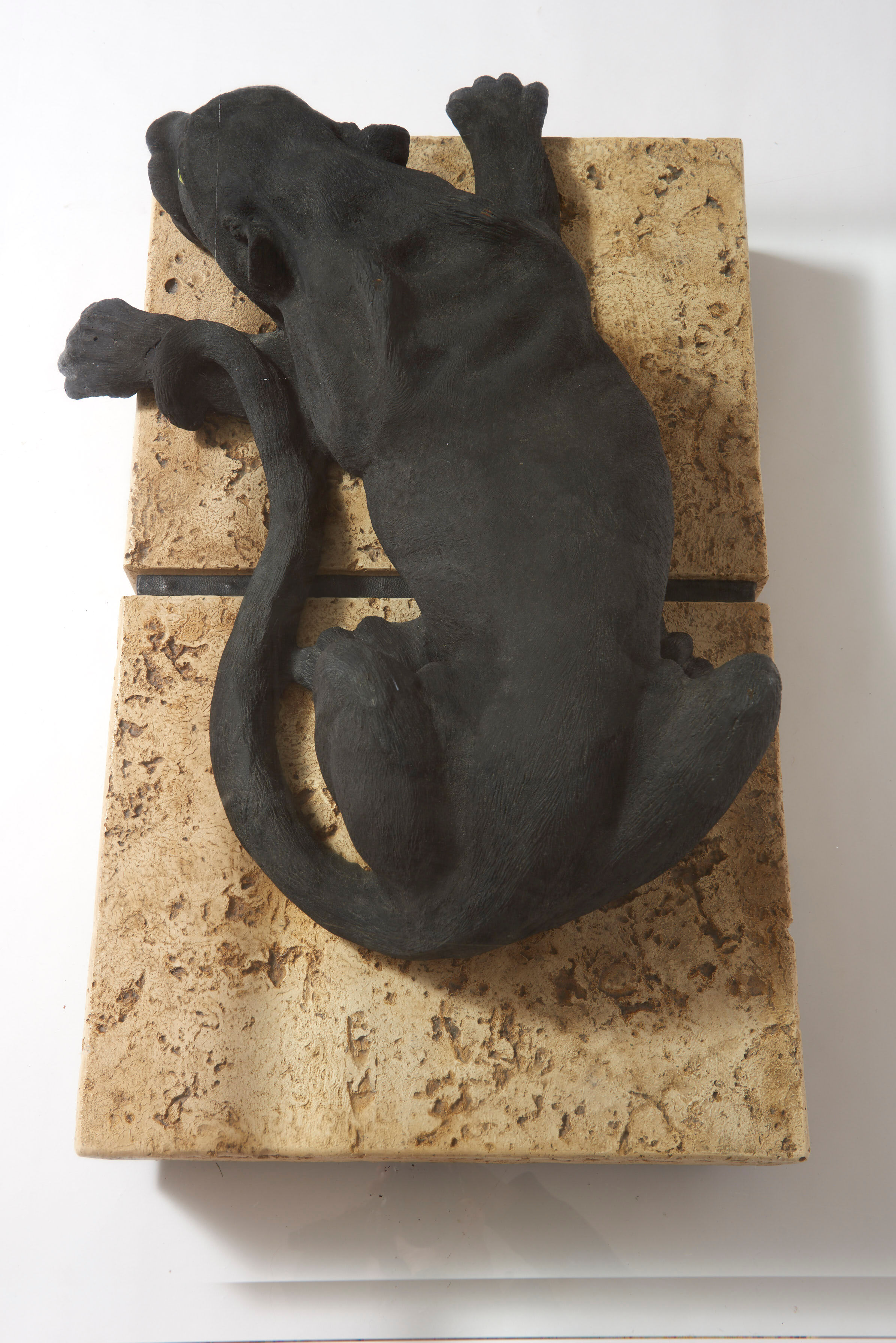 Panther coffee table on stone base and glass tablet