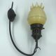 Decorative glass and metal wall light