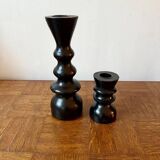 Pair of black turned wood candlesticks