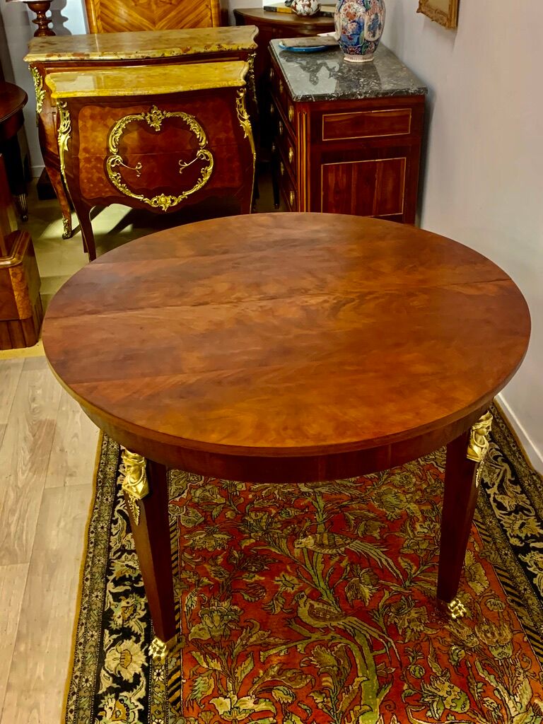 Empire style round table in mahogany