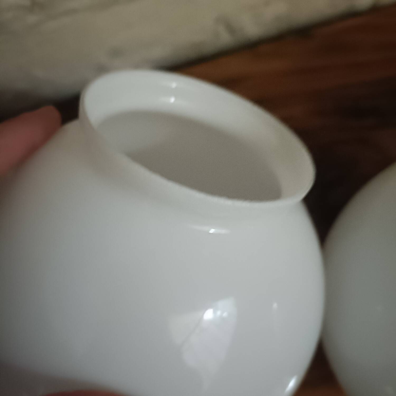 Pair of spherical lampshades in opaline.