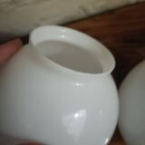 Pair of spherical lampshades in opaline.