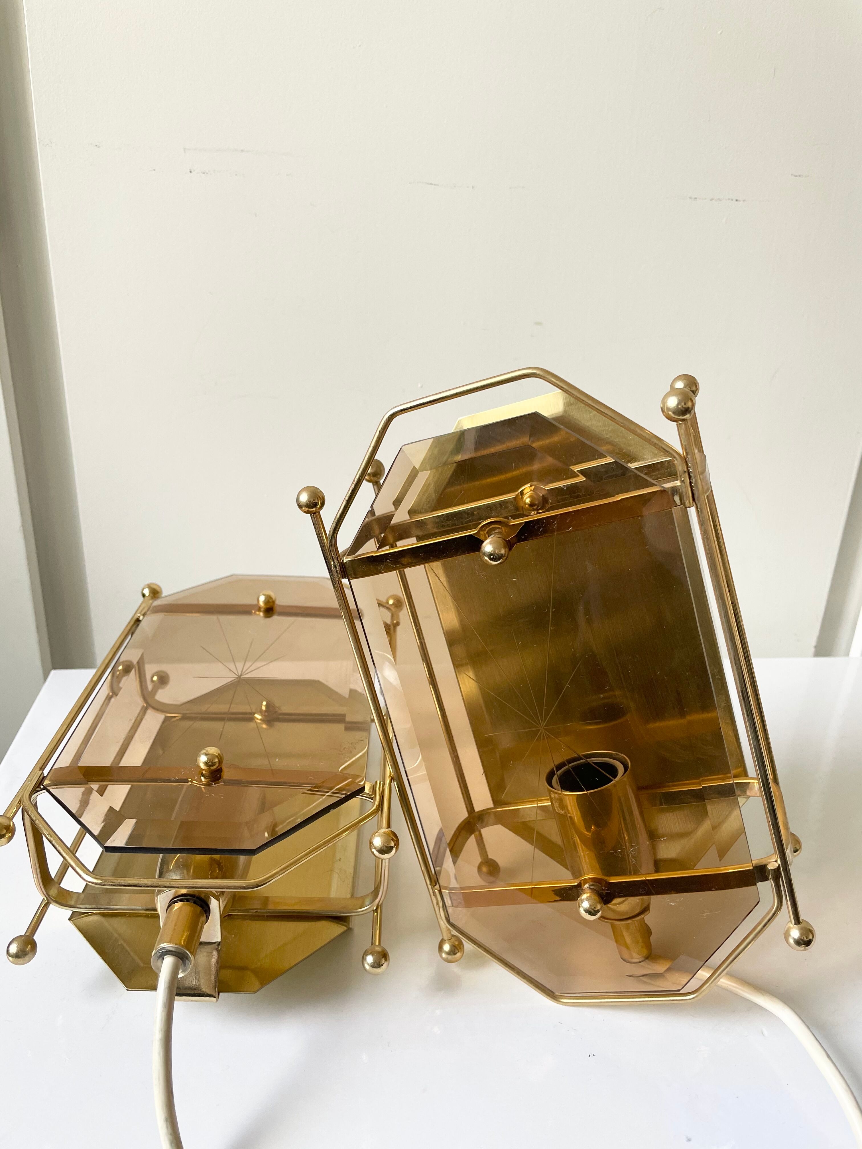 Pair of Scandinavian Vintage  wall light Sconce in Brass & Amber colored Glass