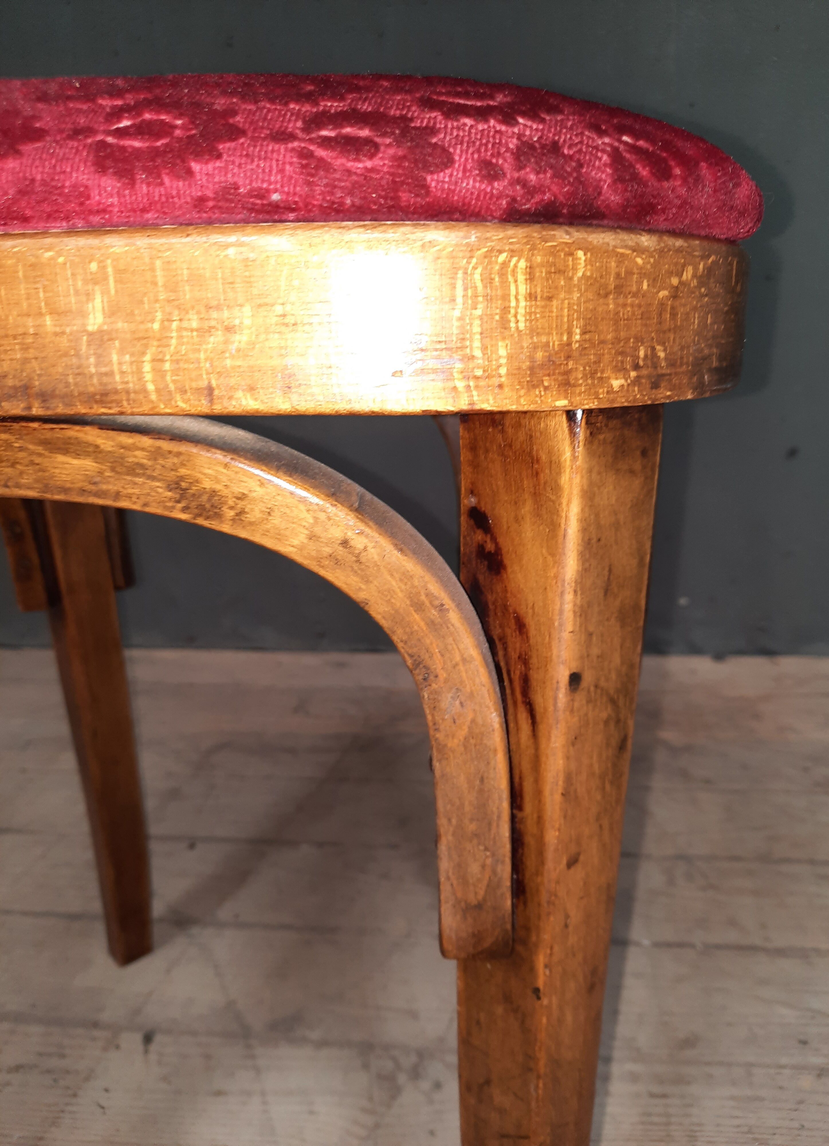Curved wooden stool