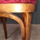 Curved wooden stool