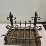 pair of chenets with iron grid and drawer