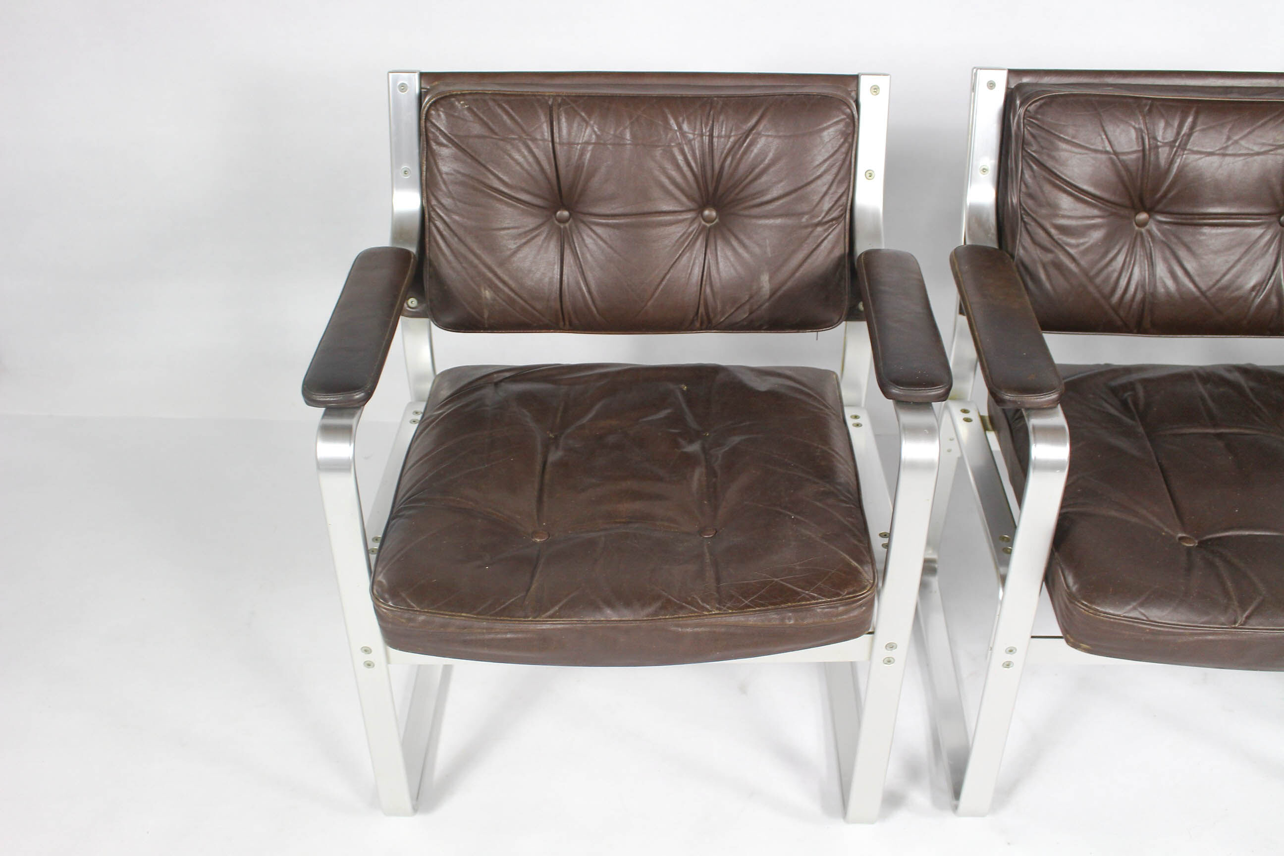 Swedish Mid Century Leather And Aluminum Armchairs By Karl Erik Ekselius For Joc Vetlanda, Set Of 4
