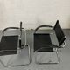 Pair of design armchairs in imitation leather chrome