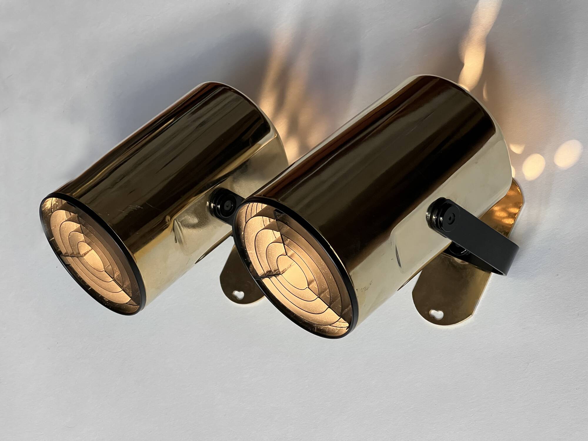 Pair of golden wall lights "Orion" by Per Sundstedt for Kosta Lampan. Sweden 1970s