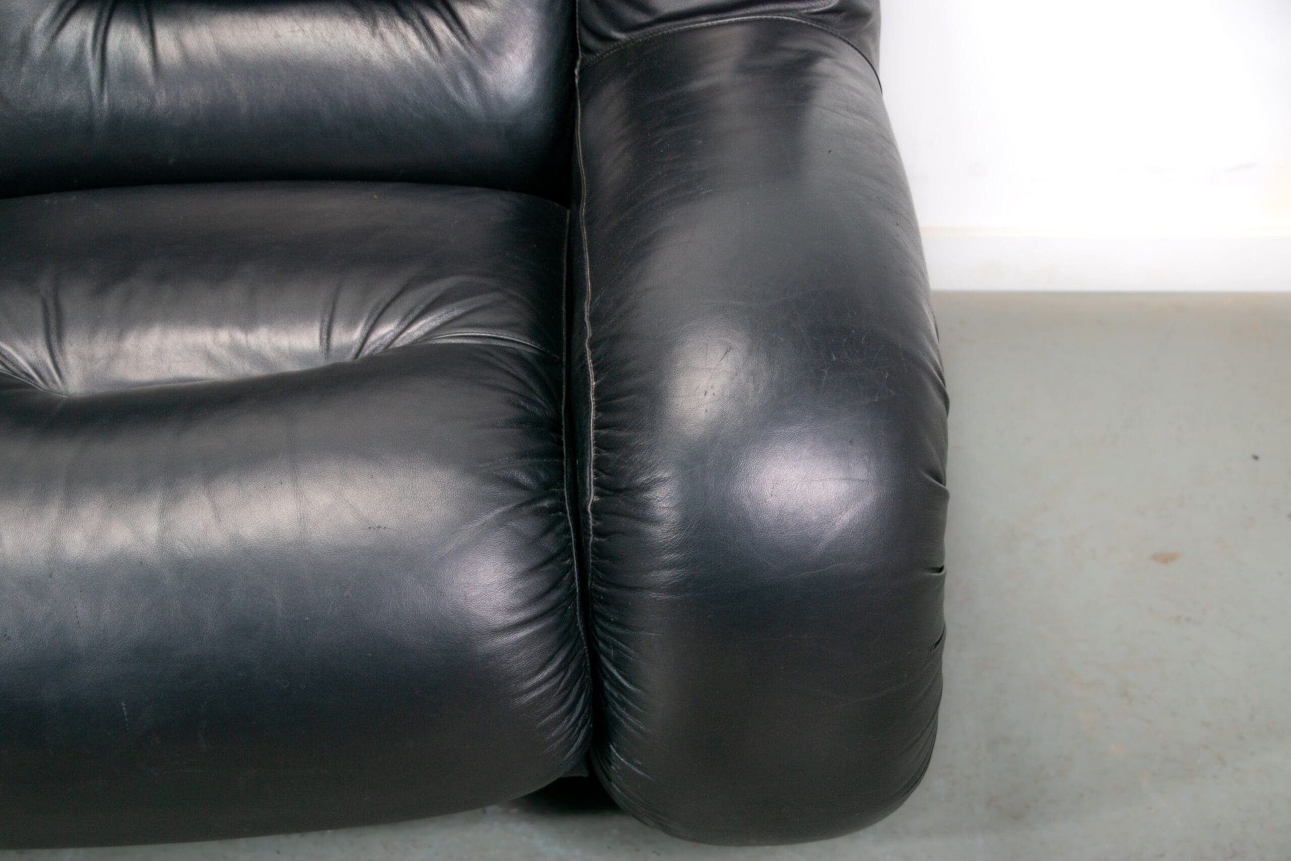 Black leather space age Italian 2 seater sofa