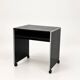 Vintage black computer desk on wheels with an aluminium edge.