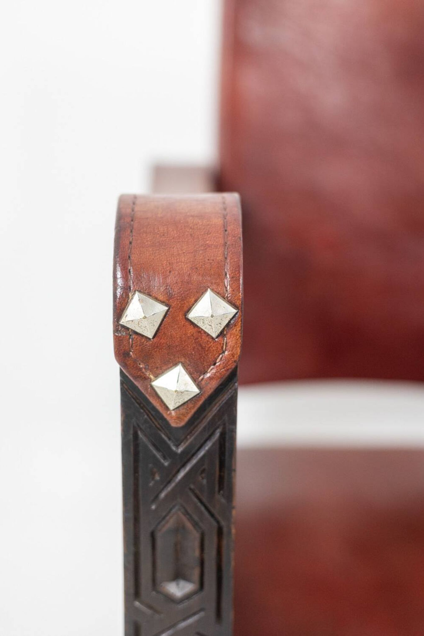 “Safari” armchair in wood and cognac leather. 1960s/70s.