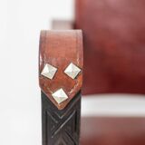 “Safari” armchair in wood and cognac leather. 1960s/70s.