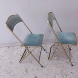 Two folding opera chairs in velvet