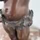 Candelabra with cherub in patinated bronze